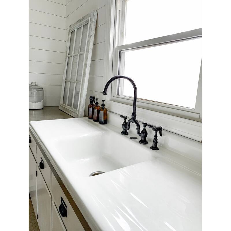 Kingston Brass Tudor Bridge Kitchen Faucet with Brass Sprayer