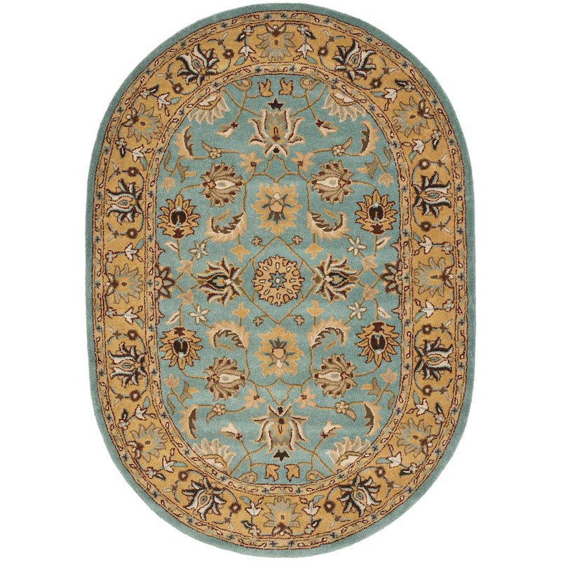 SAFAVIEH Handmade Heritage Mallory Traditional Oriental Wool Rug - 4'6" x 6'6" Oval - Blue/Gold
