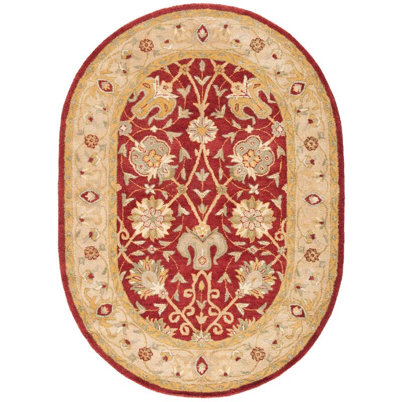 SAFAVIEH Handmade Antiquity Mazie Traditional Oriental Wool Rug - 4'6" x 6'6" Oval - Rust