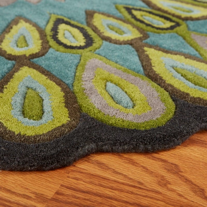 Sevita Bursting Peacock Wool Area Rug