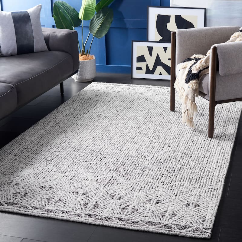 SAFAVIEH Handmade Ebony Golnaz Modern Wool Rug - 5' x 8' - Ivory/Black