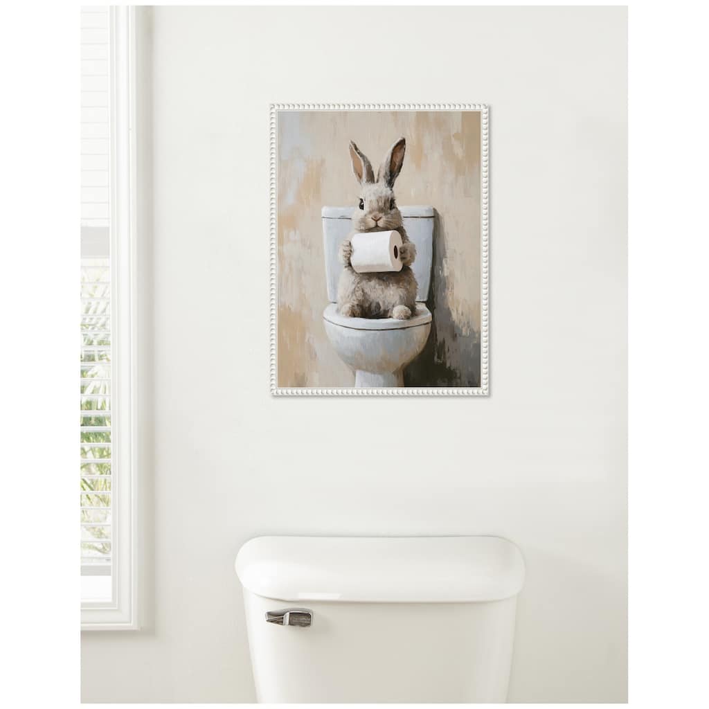 Kate and Laurel Sylvie Cute Bunny Toilet Paper Roll Toilet Bathroom Art Framed Canvas by The Creative Bunch Studio