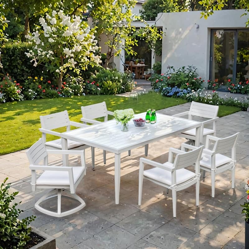 7-Piece Aluminum Patio Set – 4 chairs, 2 swivel rockers (Sunbrella cushions),and a white/gray two-tone table with umbrella hole.