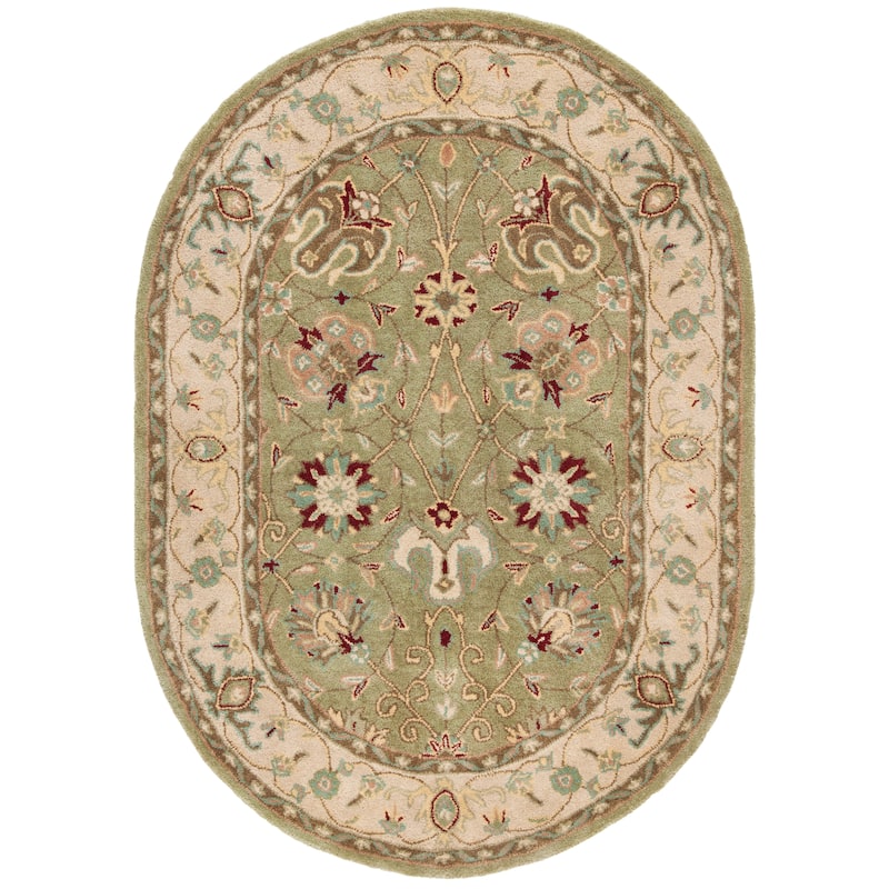SAFAVIEH Handmade Antiquity Mazie Traditional Oriental Wool Rug - 7'6" x 9'6" Oval - Sage