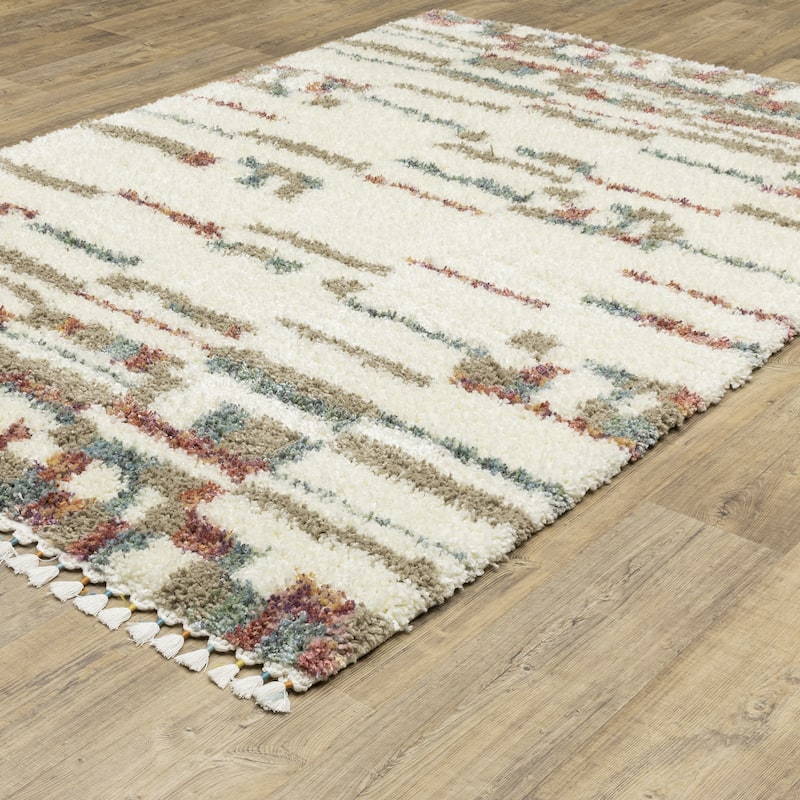 Style Haven Aire Abstract Stripe Ivory/ Multi Shag Tassel Fringe Area Rug.