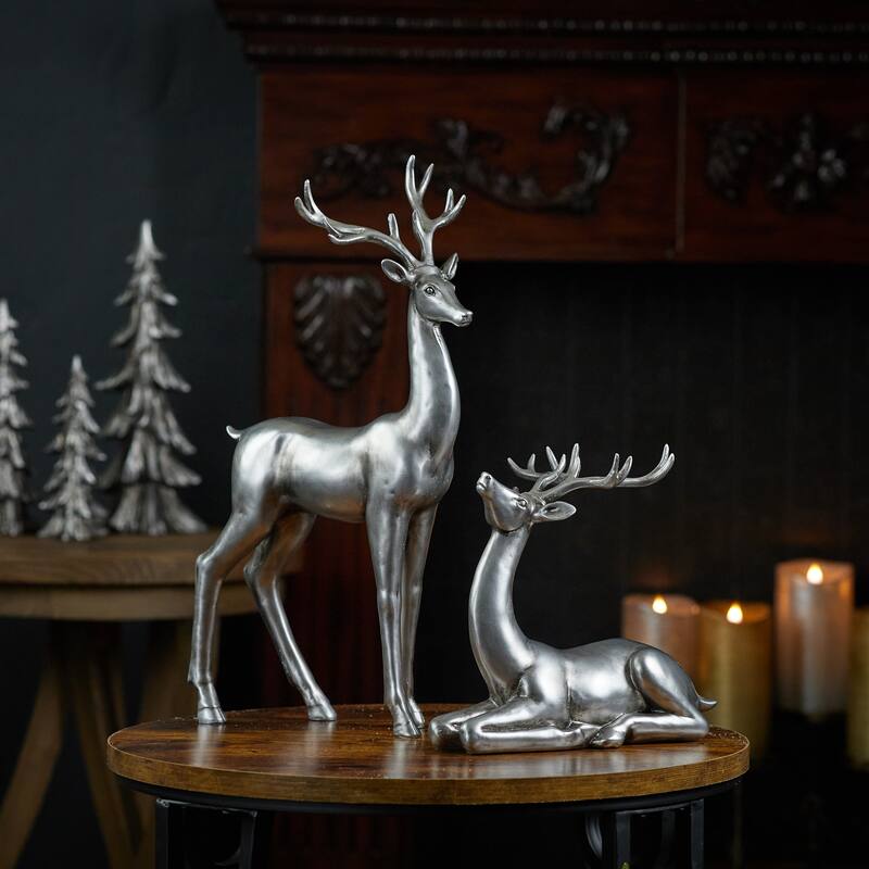 Set of 2 Silver Metallic Deer Figurines for Christmas Decor with Standing and Laying Holiday Accents - 9.5”L x 6”W x 17”H