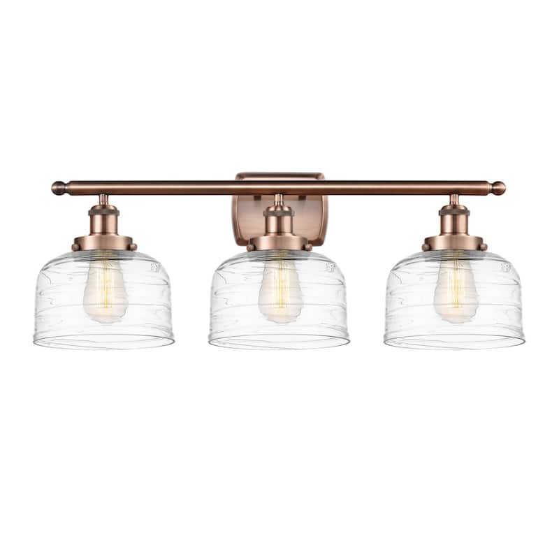 Innovations Lighting 916-3W-13-28 Bell Vanity Bell 3 Light 28" Wide - Antique Copper / Clear Deco Swirl