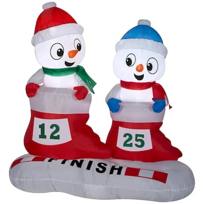 Gemmy Christmas Airblown Inflatable Snowman in Stocking Races Scene, 4 ft Tall, Multicolored