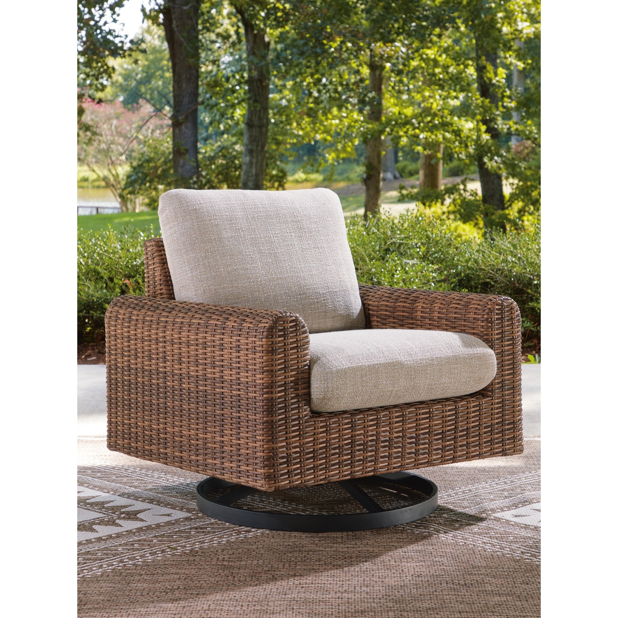 Signature Design by Ashley Angel Island Gray/Brown Outdoor Swivel Lounge Chair with Cushion
