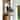 VAXCEL Bryce 13 in. H 1-Light Burnished Bronze Rustic Deer Outdoor Wall Sconce, Steel, Clear Seeded Glass Shade