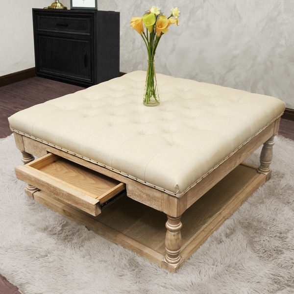 Suleiman Tufted Padded Cocktail Ottoman with Shelf and Drawer. Opens flyout.