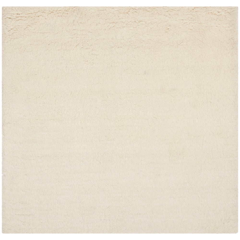 SAFAVIEH Handmade Flokati Jannine Shag Solid Wool Rug