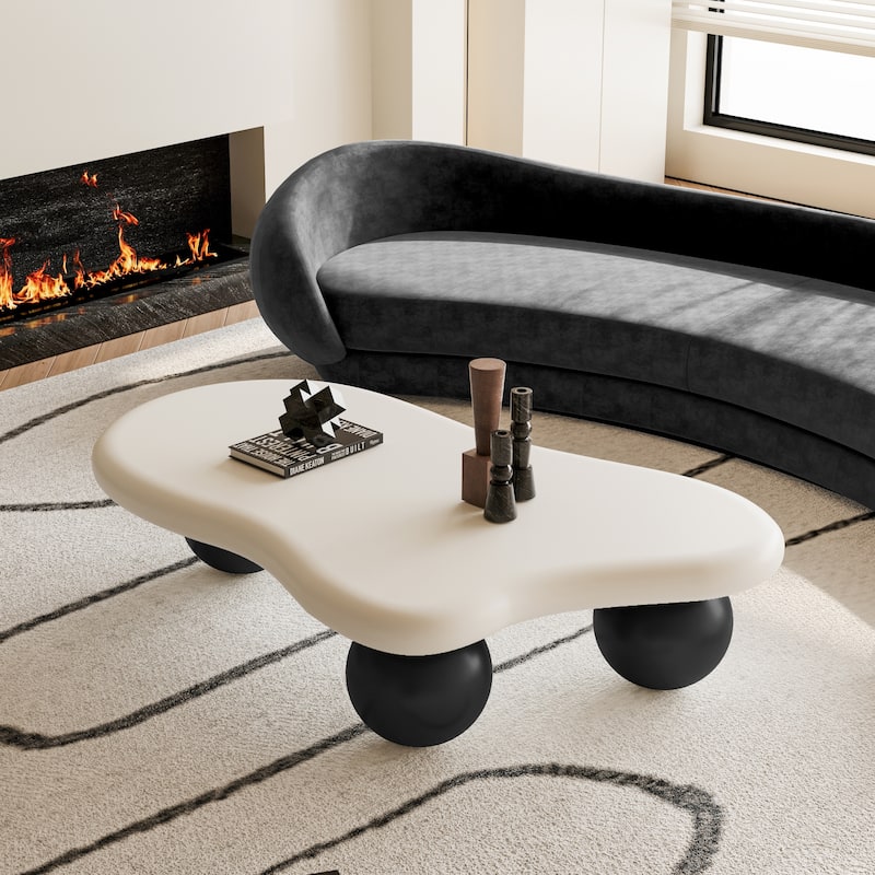 47 Inch Cloud Shaped Coffee Table with 3 Ball Legs for Living Room