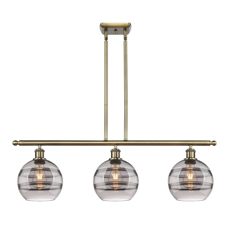 Innovations Lighting 516-3I-10-36 Rochester Linear Rochester 3 Light - Antique Brass / Smoked