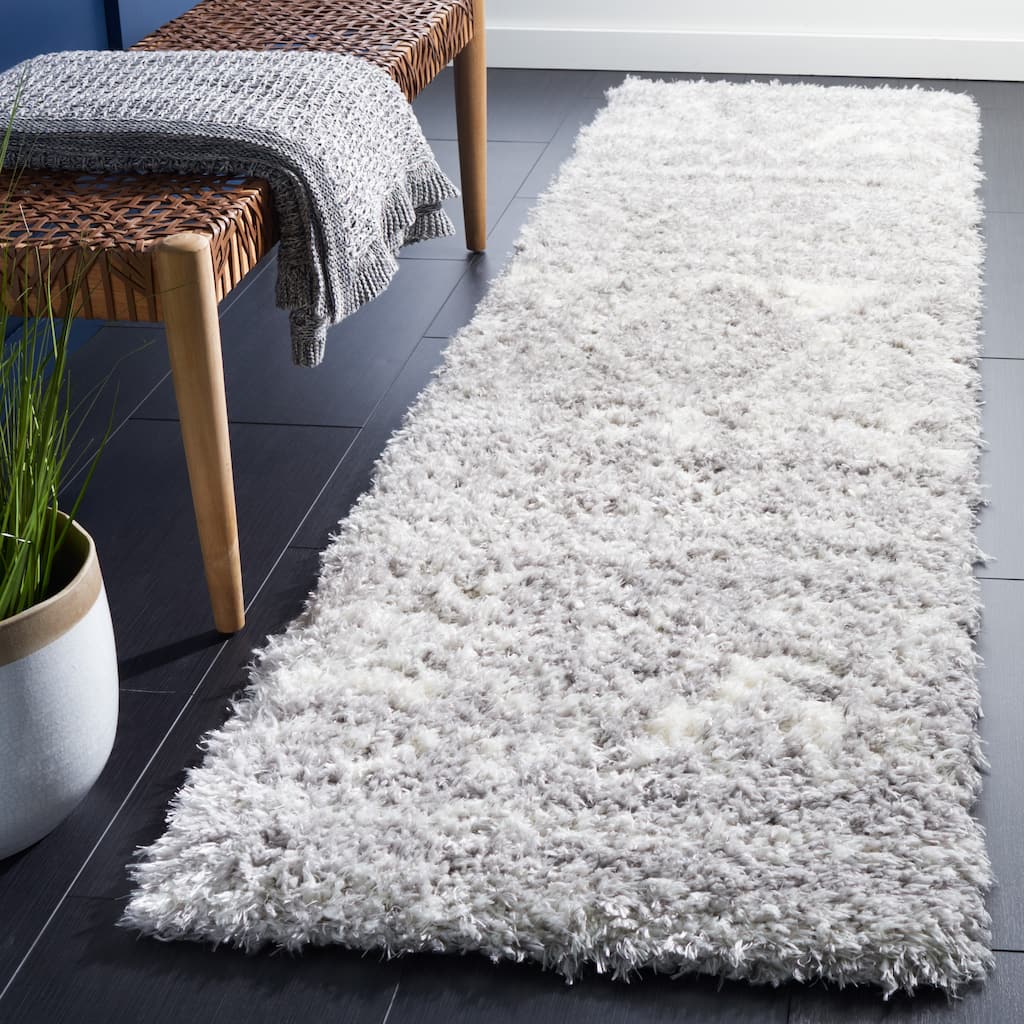 SAFAVIEH Handmade Flokati Yaffa Shag Solid Polyester Rug