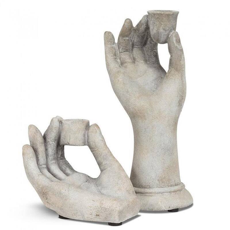 Hand Holding Between Fingers Taper Candle Holder
