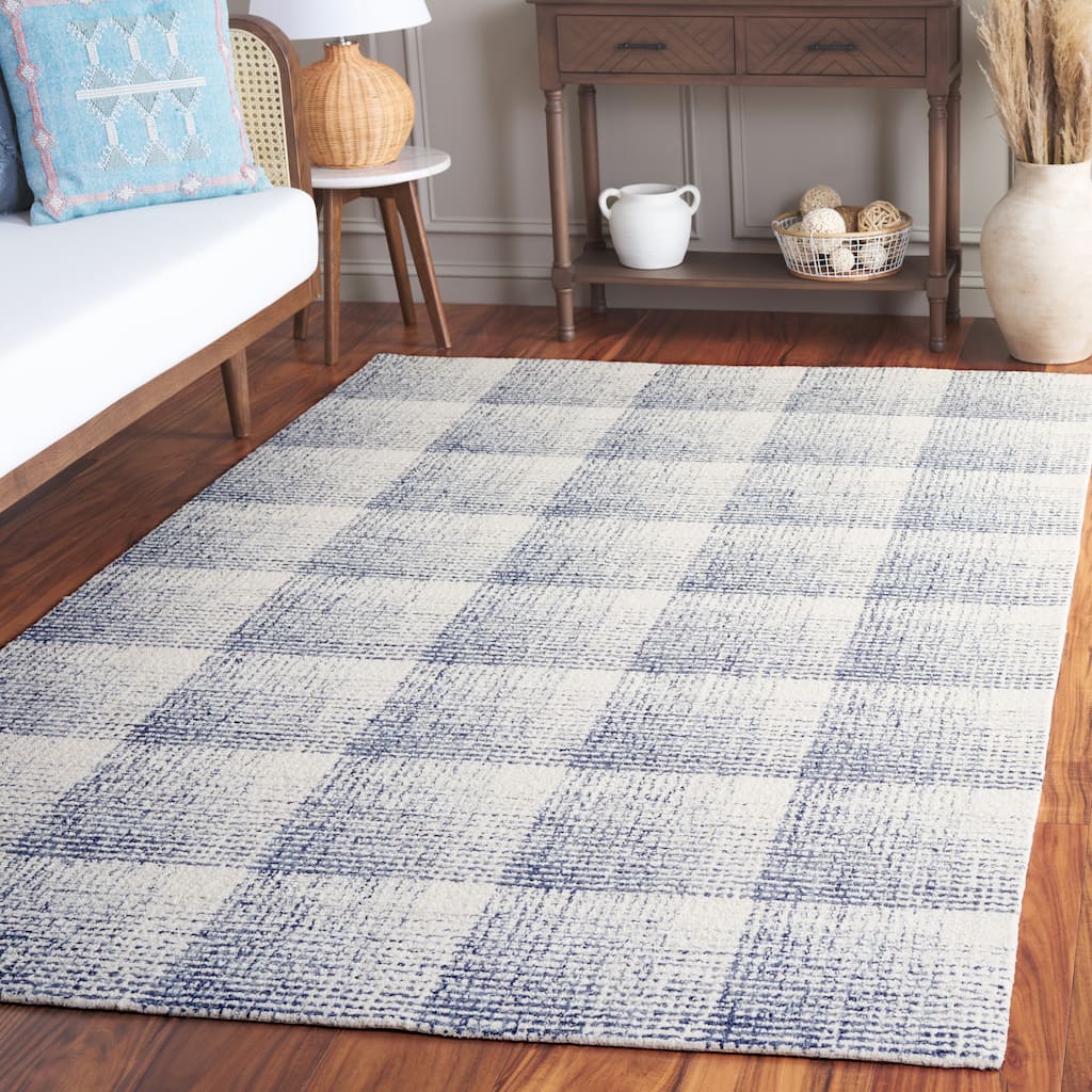 SAFAVIEH Handmade Ebony Corinda Modern & Contemporary Wool Rug