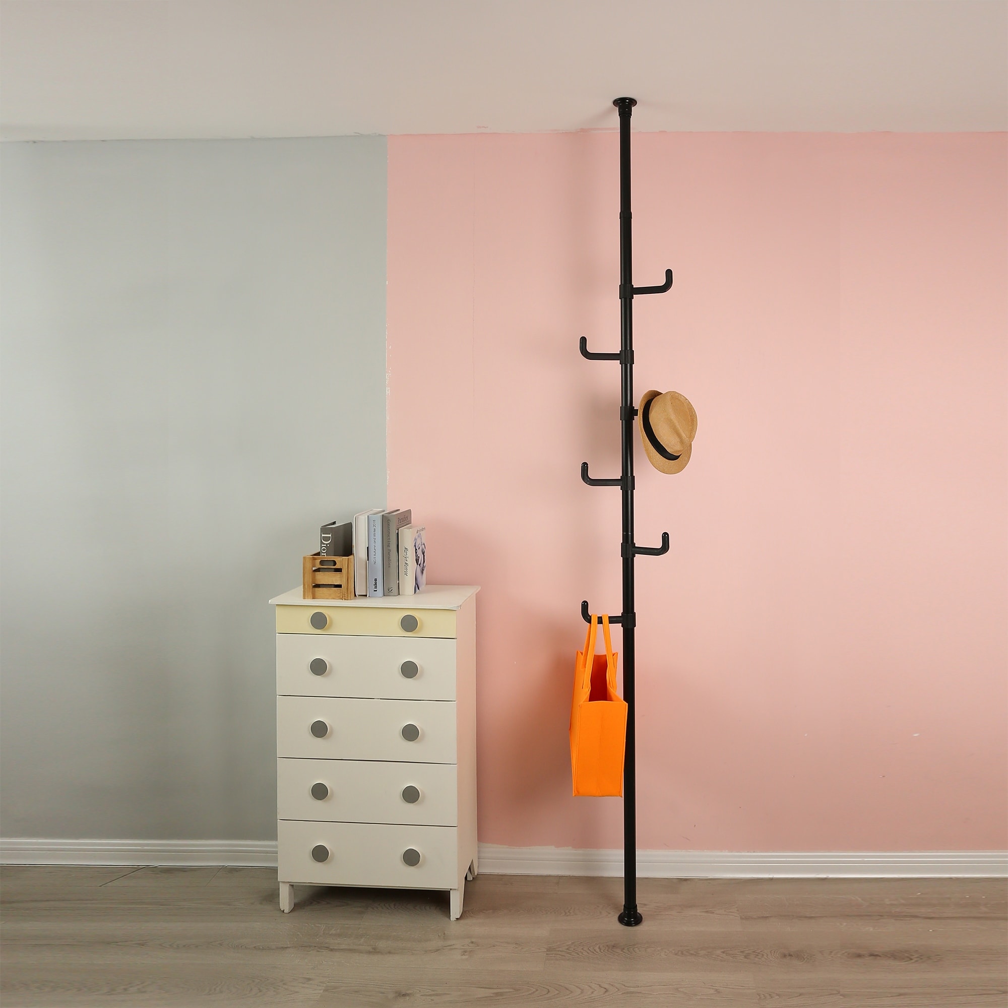 Vertical tension rod clothes rack top