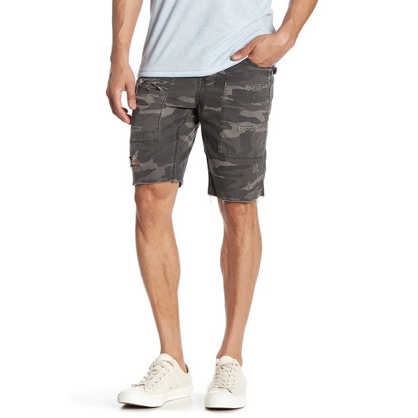 distressed camo shorts