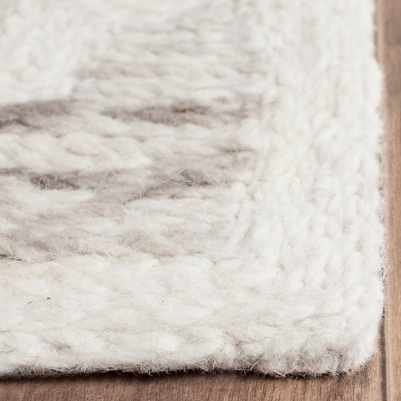 SAFAVIEH Handmade Himalaya Unnie Modern Wool Rug