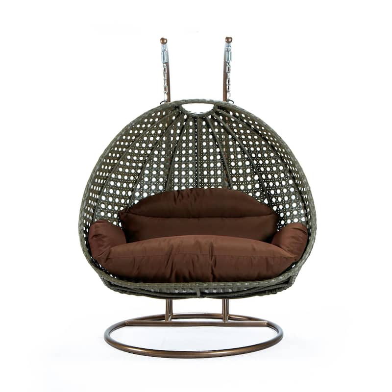 LeisureMod 2-Person Hanging Egg Swing Chair with Metal Stand - Handcrafted Beige Wicker, Patio Hammock Lounger with Cushions