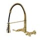 preview thumbnail 11 of 9, Kingston Brass Heritage 1.8 GPM Wall Mounted Widespread Bridge Pull Brushed Brass