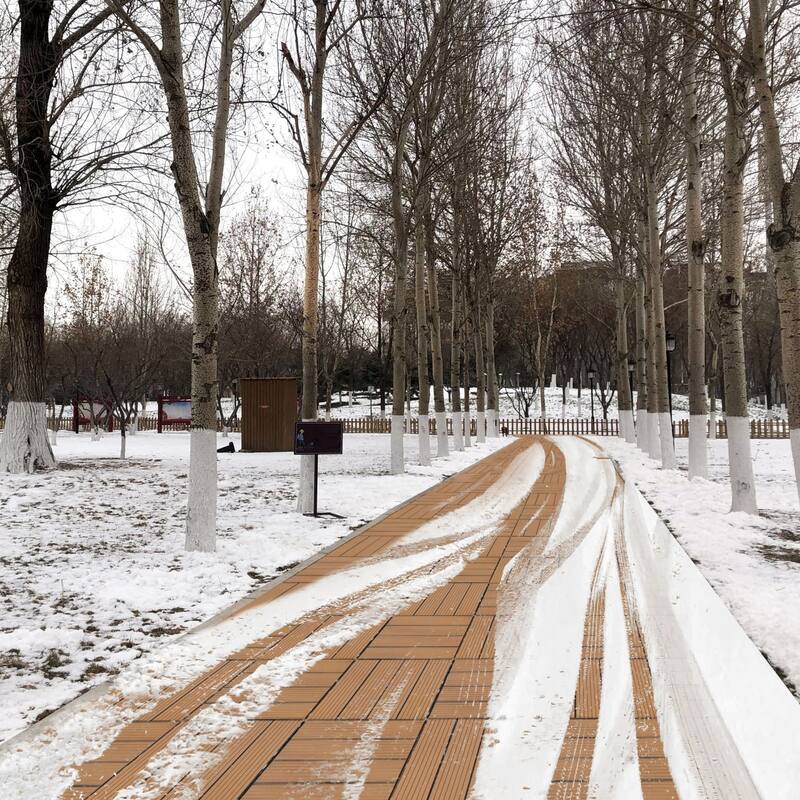 11.8" x 11.8" square wood-plastic composite deck tiles