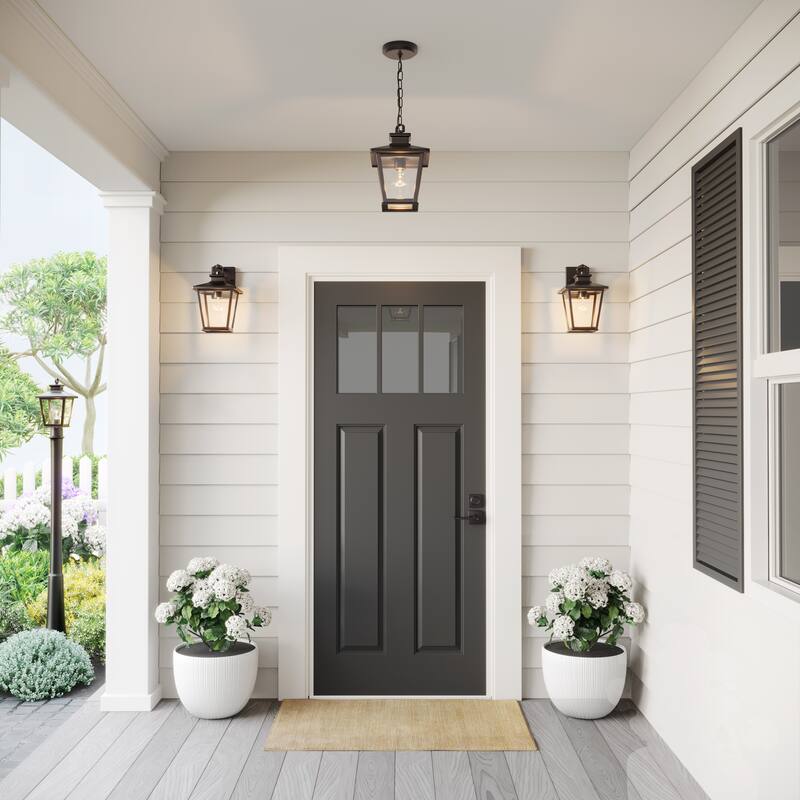 Millennium Lighting Bellmon 1 Light Outdoor Wall Sconce in Powder Coat Bronze with Clear Glass Shade