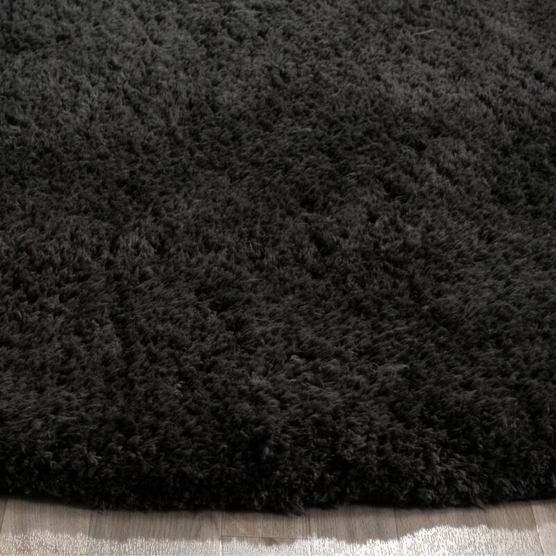 SAFAVIEH Handmade Sheep Shag Dochia Solid Polyester Rug