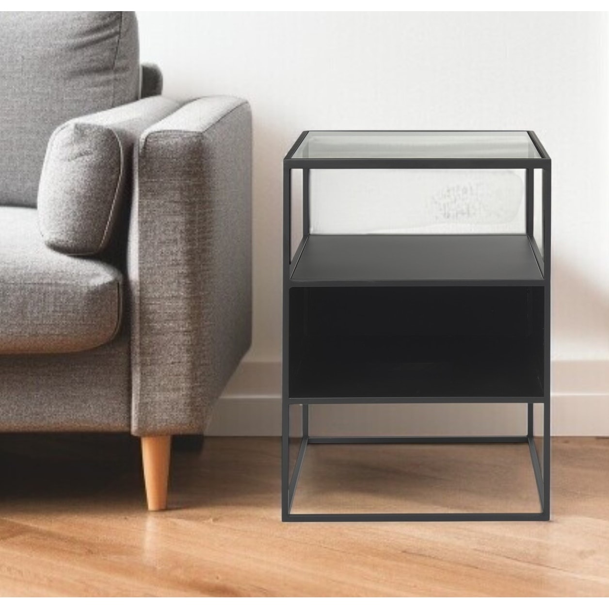 HomeRoots 21" Clear and Black Glass and Metal Square Frame End Table With Two Shelves - 15.75 in. x 21.26 in. x 15.75 in.