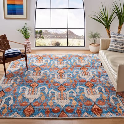 SAFAVIEH Couture Hand-Knotted Luxor Bengu Banana Silk Rug