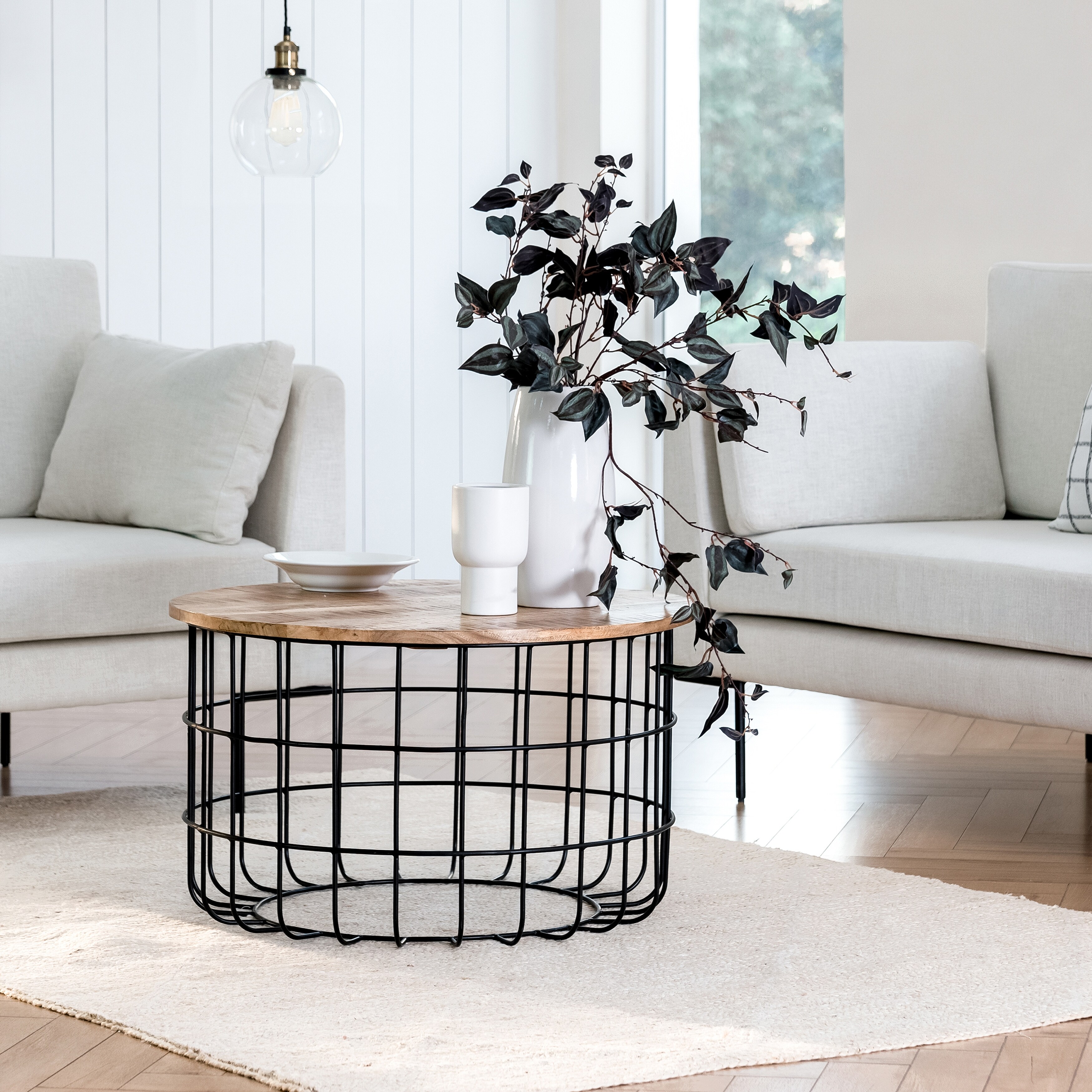 Carbon loft chessor black and deals natural wood cage coffee table