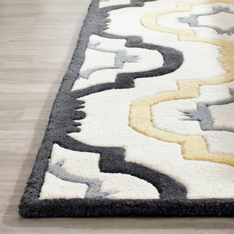 SAFAVIEH Handmade Chatham Vaka Modern Wool Rug