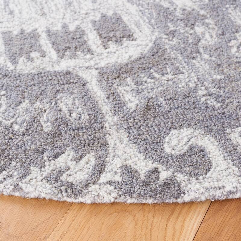 SAFAVIEH Handmade Ikat Riina Bohemian Wool Rug