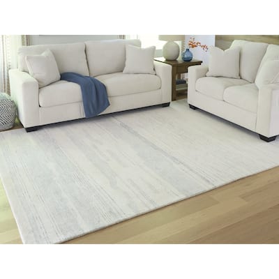 Signature Design by Ashley Genemost Beige/Blue Area Rug
