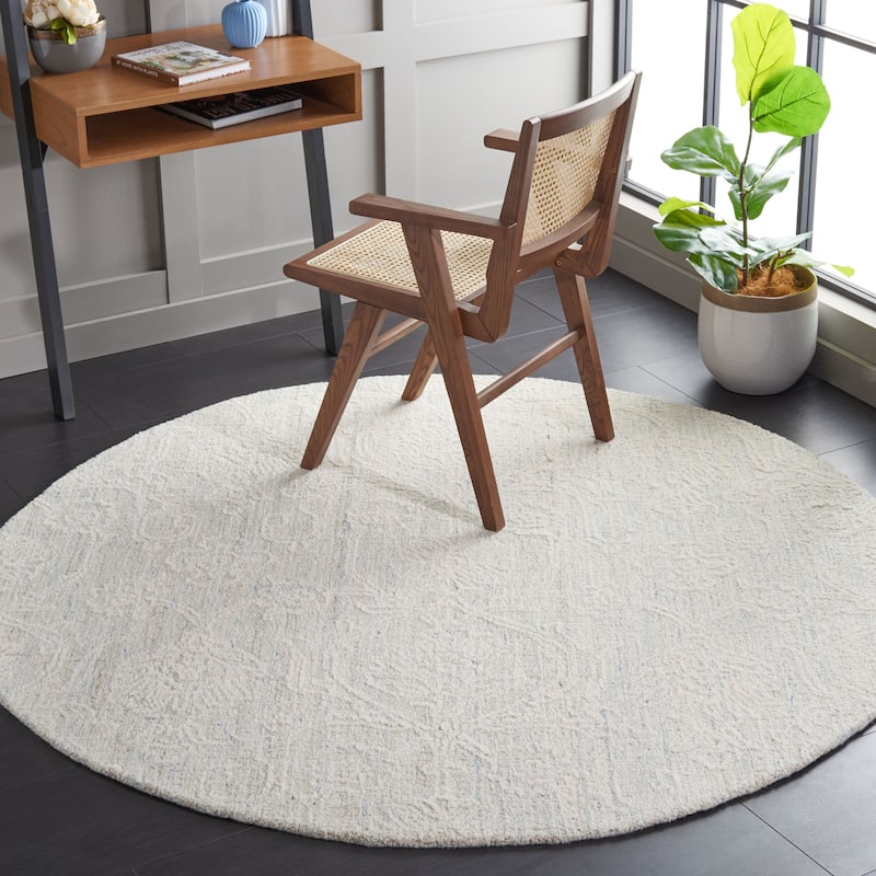 SAFAVIEH Handmade Ebony Nini Modern Wool Rug - 6' Round - Teal/Ivory