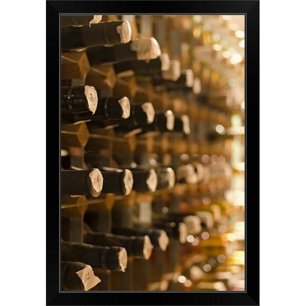 "United Kingdom, Bristol, old wine bottles on cellar shelves" Black Framed Print