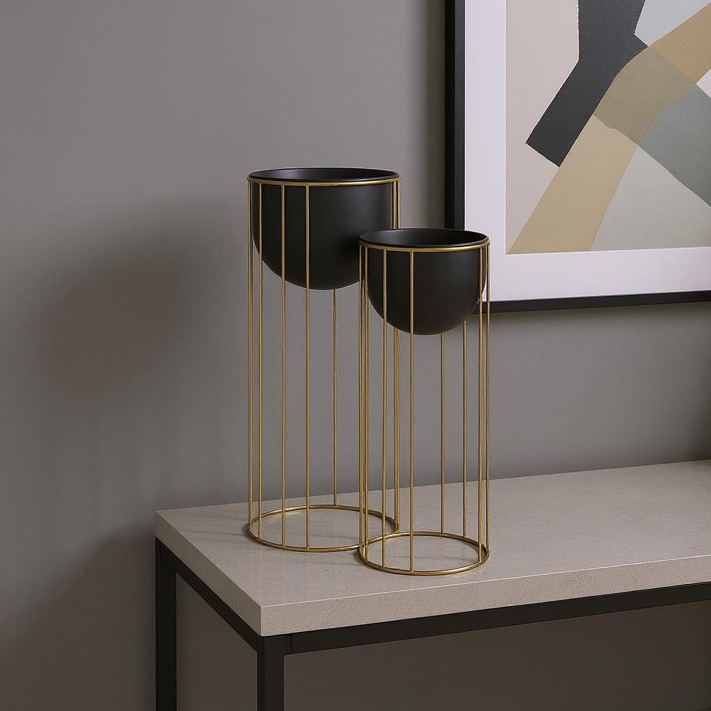 HomeRoots Set of Two Black Metal 20 Ounce Round Pot Planters - 10.43 in. x 25.39 in. x 10.43 in.