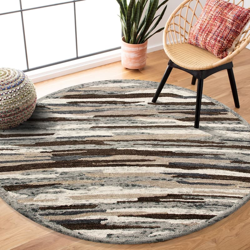 Sevita Distressed Cabin Camouflage Round Rug