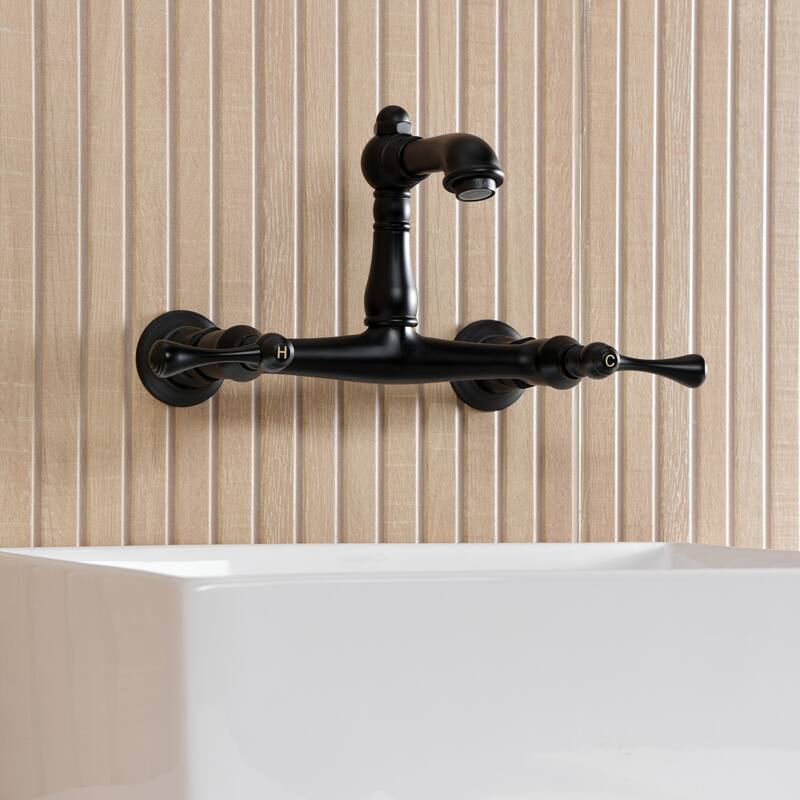 Kingston Brass English Country Two-Handle 2-Hole Wall Mount Bathroom Faucet
