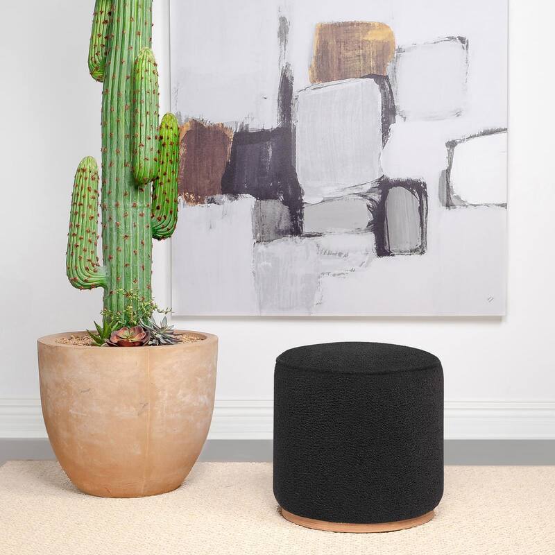 Keita Round Upholstered Ottoman - Black/Brown