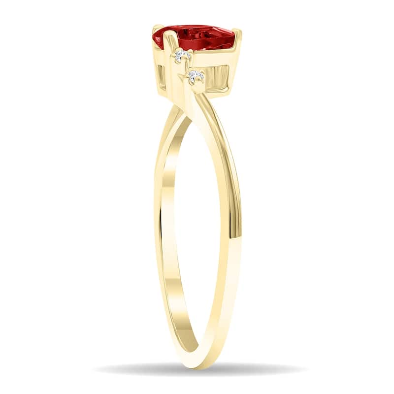 Women's Pear Shaped Garnet and Diamond Wave Ring in 10K Yellow Gold