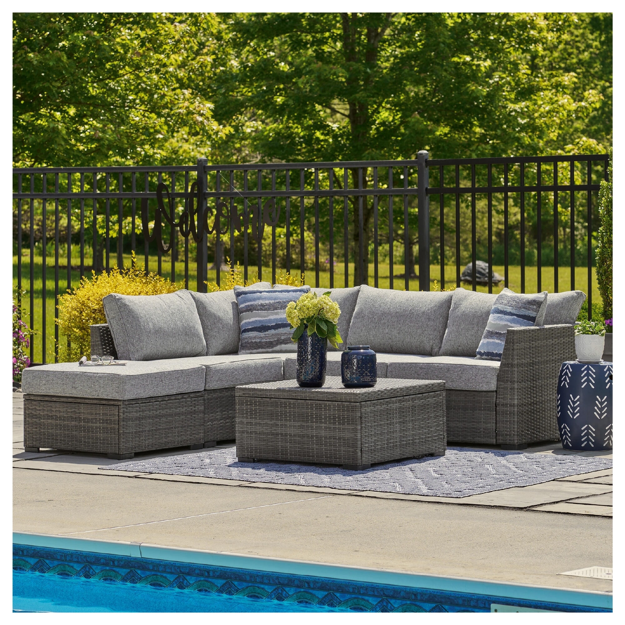 Signature Design by Ashley Petal Road Gray Outdoor Loveseat Sectional/Ottoman/Table Set (Set of 4)