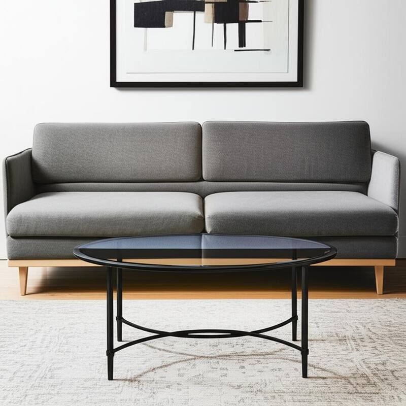 HomeRoots 45" Clear and Black Glass and Metal Oval Coffee Table - 19" H x 45" W x 25" D