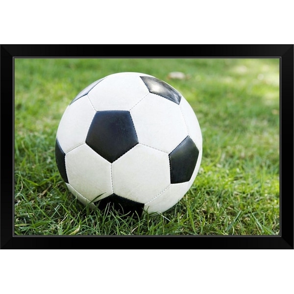 "Soccer ball on grass" Black Framed Print