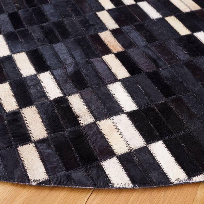 SAFAVIEH Handmade Studio Leather Helgrit Mid-Century Modern Rug