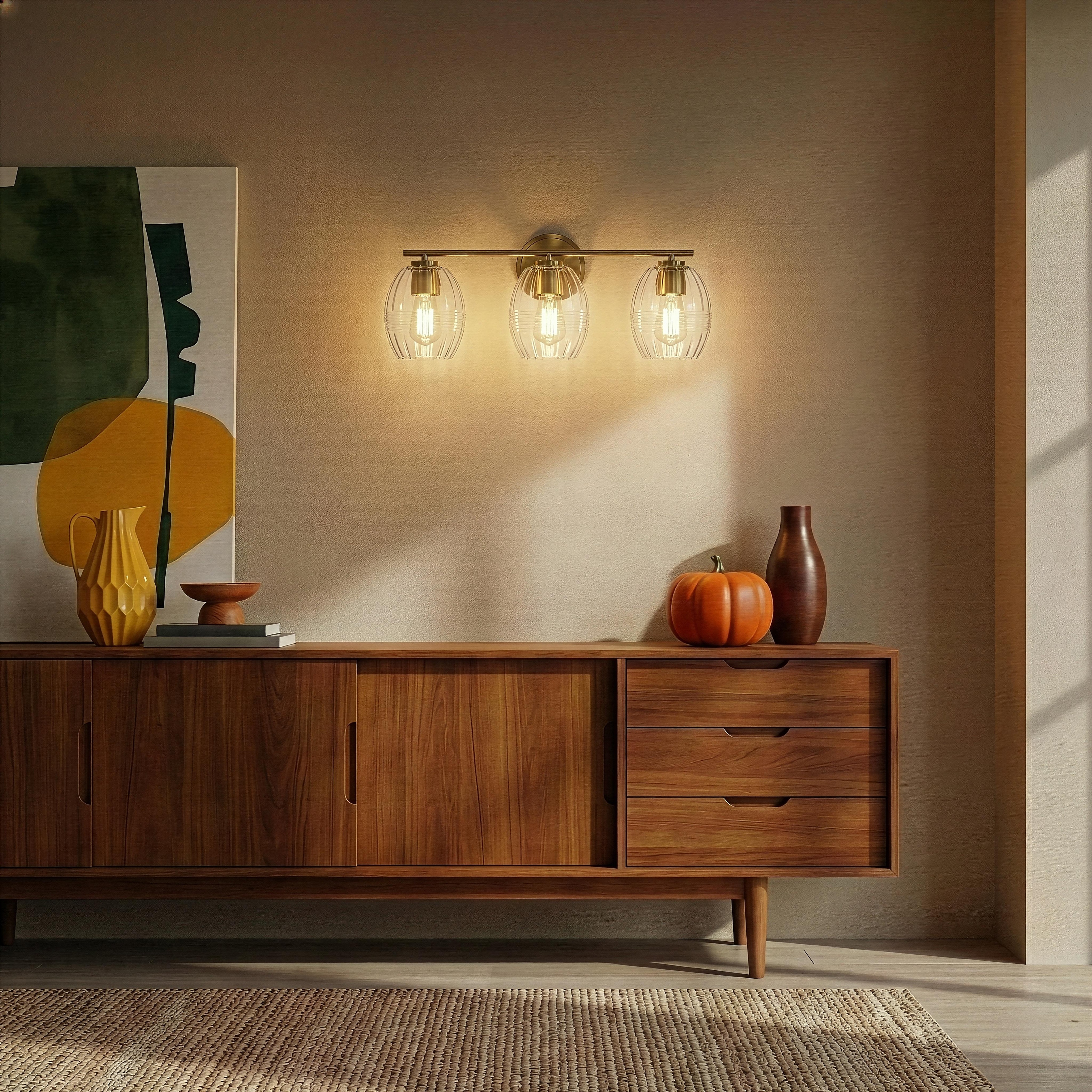 Lunix Three-Light Bathroom Vanity Fixture with Clear Glass Shades