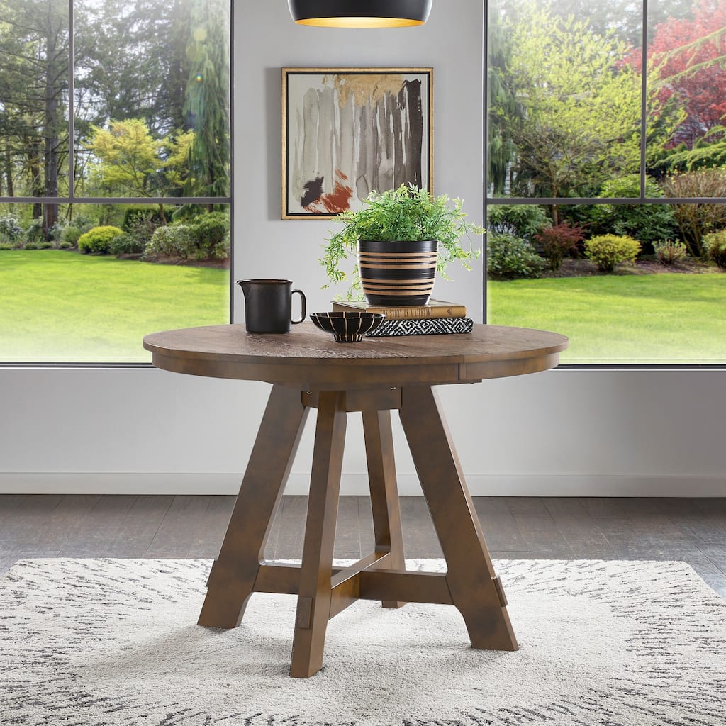 Harstad Wood Finish Extendable Round Dining Table by iNSPIRE Q Modern