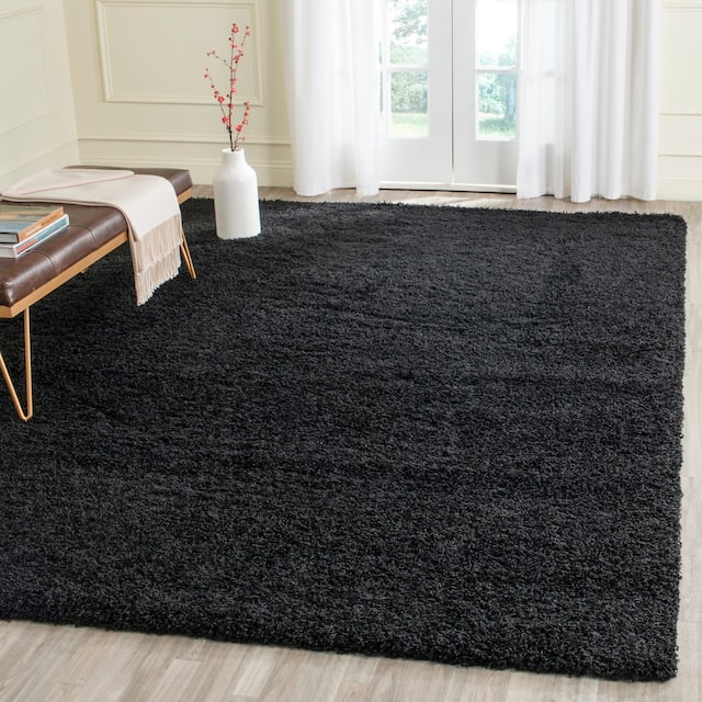 SAFAVIEH Laguna Shag Verdiana Solid Color 2-inch Thick Shag Rug - 6'7" x 9'6" - Black