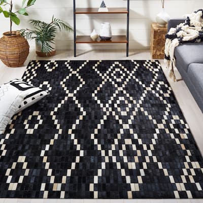 SAFAVIEH Handmade Studio Leather Helgrit Mid-Century Modern Rug